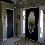 Black Interior Clear Exciting Black Interior Doors And Clear Glass Screen In Entrance Completed With Rug And Wall Decorations Also Furnished With Antique Chandelier Interior Design Black Interior Doors And Its Elegant Appearance