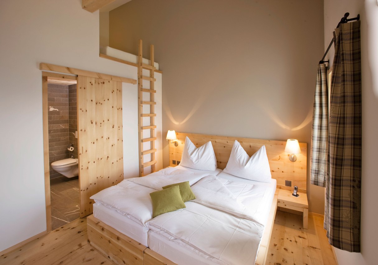 Contemporary Bedroom Wooden Exciting Contemporary Bedroom With Natural Wooden Design Furnished With Sliding Interior Wood Doors Also Completed With White Bed And Wall Sconces Interior Design The Possible Combination Of The Interior Wood Doors