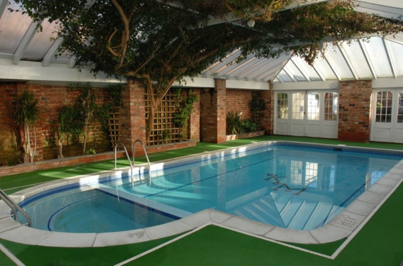Green Lawn Modern Fake Green Lawn Idea Feat Modern Small Indoor Swimming Pool With Glass Ceiling And Brick Wall Design Pool  Making Small Swimming Pool In Best House 
