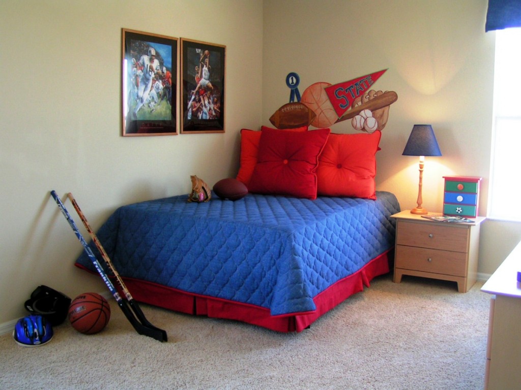 Bed Applying Blue Fascinating Bed Applying Red And Blue Color In Boys Bedroom Ideas Furnished With Night Lamp On Nightstand Drawers And Completed With Wall Picture Frame Decorations Bedroom Boys Bedroom Ideas: The Important Aspects