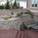 Stoned Floor With Fascinating Stoned Floor Tile Paired With Comfy Brown Outdoor Seating Area Set Beside Curved Retaining Wall Idea Bedroom  Fabulous Retaining Wall Design Ideas 