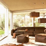 Pendant Lighting Couch Funky Pendant Lighting And Chocolate Couch Feat Square Ottomans Plus Animal Skin Rug In Masculine Country Living Room Idea Living Room  Beautiful Country Living Room Ideas 