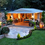 Grassed Garden Floored Green Grassed Garden With Wooden Floored Dining Room And Dining Table And Outdoor Kitchen For Outdoor Living Spaces Ideas Outdoor Charming Outdoor Living Spaces For Your Modern Dwelling