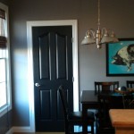 Wall And Doors Grey Wall And Black Interior Doors Near Window Facing Dining Set Under Hanging Lamp Interior Design Awesome Black Interior Doors Completing Elegant Room Design