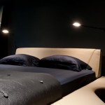 Apartment Design And Impressive Bedroom Apartment Design With Outstanding Black And Brown Bed Plus Wall Lighting Ideas Apartment Spacious Two-Bedroom Apartment With Dramatic Interior Design