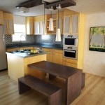 Simple Kitchen Apartment Inspiring Simple Kitchen Of Small Apartment Ideas With Range On Island Furnished With Dark Brown Table And Bench Completed With Cupboard Equipped With Sink And Ovens Apartment Small Apartment Ideas Which Is Suited For Compact House Design