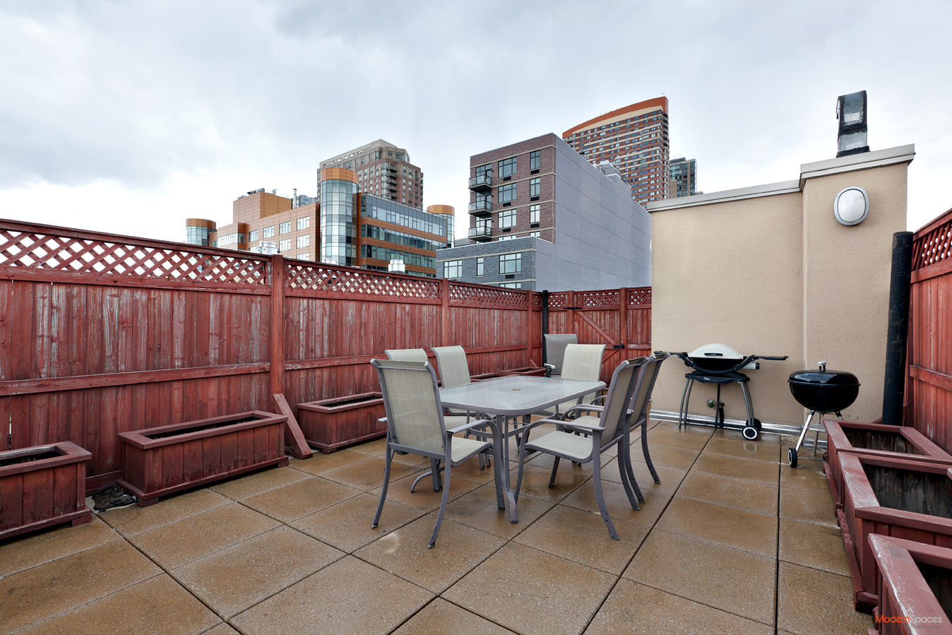 Island City Modern Long Island City Apartment Featured Modern Outdoor Dining Area And Freestanding Grill Plus Beautiful Wooden Fence Also Water Feature Decor Idea Apartment Compact Long Island City Apartment Interior Design In Open Plan Layout