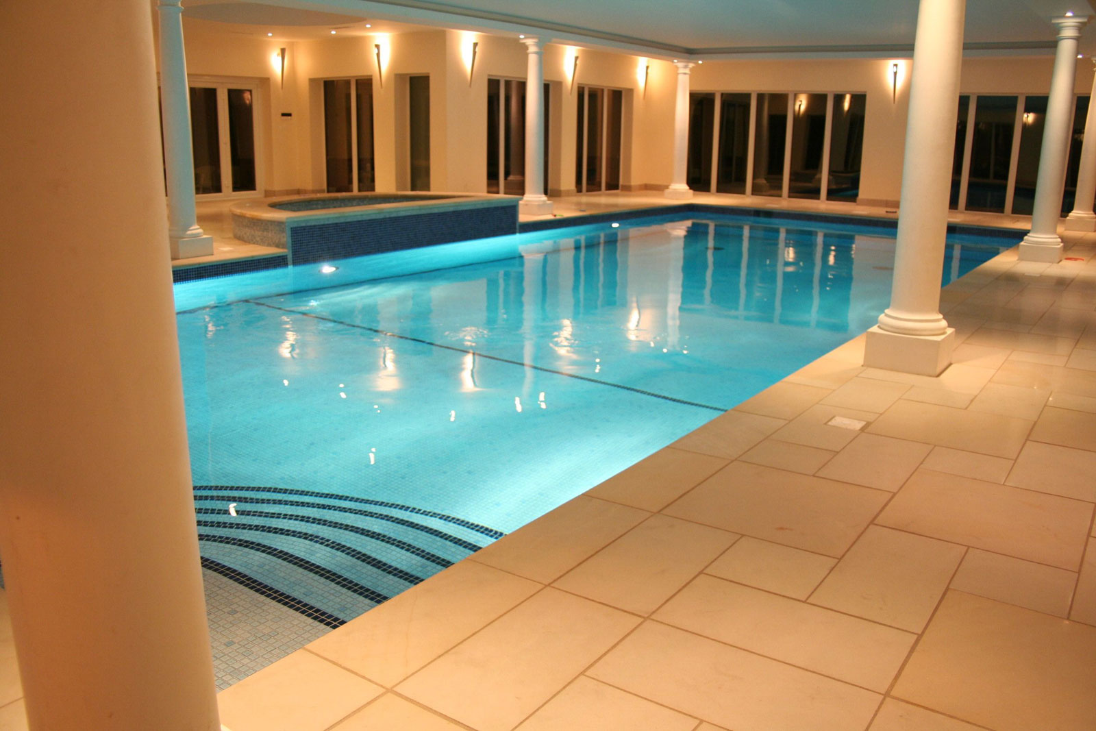 Swimming Pool Modern Magnificent Indoor Swimming Pool Design Using Modern Classical Touch With Pillar Decor And Concrete Tile Floor Edging For Inspiration Pool Indoor Swimming Pool Covered In Awesomeness