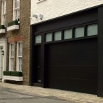 Design Of English Marvelous Garage Design Of A Classic English House With White Painted Brick Walls Black Sliding Garage Door Elegant Sliding Garage Doors In Natural Colour