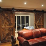 Rustic Family Sliding Mesmerizing Rustic Family Room With Sliding Interior Wood Doors Matched With Wooden Flooring Completed With Red Sofa And Furnished With Rocking Decorations Interior Design The Possible Combination Of The Interior Wood Doors
