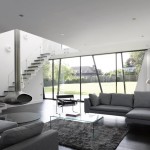 Gray Living Design Modern Gray Living Room Interior Design Using Fabric Sofa And Glass Coffee Table Completed With Futuristic Hanging Fireplace Ideas Living Room Gray Living Room In Luxury And Elegance Realm