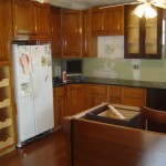 Window Beside Cabinet Nice Window Beside Wooden Top Cabinet Closed Green Backsplash Color And Brown Kitchen Corner Cabinet Near White Refrigerator Closed Floor Kitchen Kitchen Corner Cabinet With Clever Storage Systems Inside