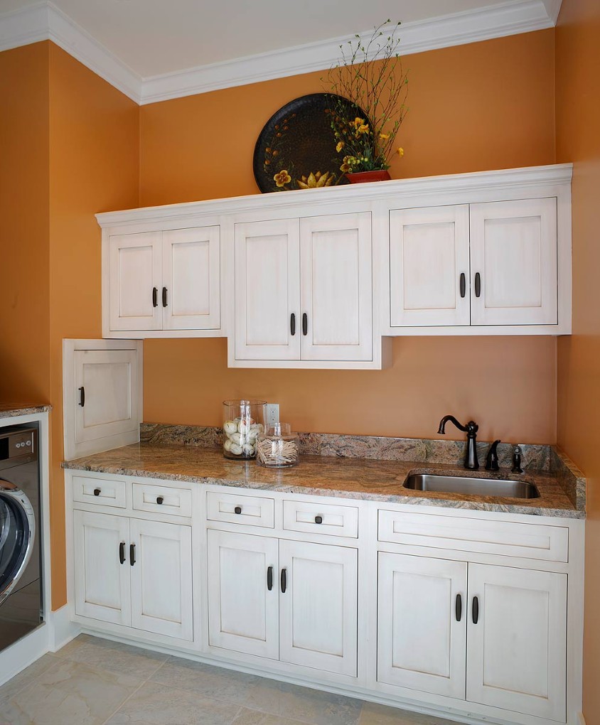 Wall Interior Great Orange Wall Interior Idea Feat Great Laundry Room Sink And White Cabinet Design Plus Black Faucet Interior Design  Laundry Room Sinks That Are Functional As Well As Decorative 