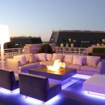 Living Spaces Top Outdoor Living Spaces In Roof Top Decorated With Modern Design Completed With Purple LED Lighting And Outdoor Fireplace Exterior Futuristic Home With Wooden Furniture And Outdoor Living Space