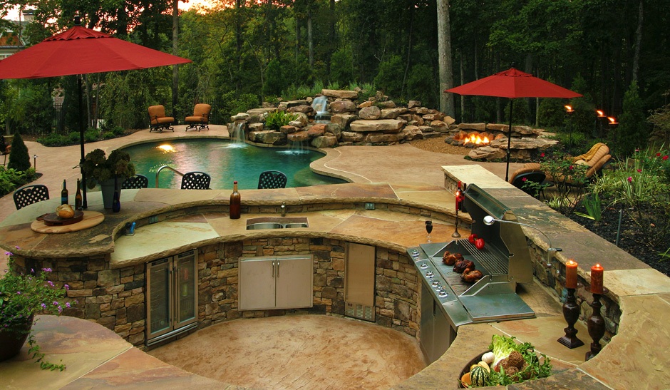 Curved Outdoor Stainless Outstanding Curved Outdoor Kitchen With Stainless Steel Grill Also Red Umbrella Plus Gorgeous Free Form Pool With Waterfall Kitchen Outdoor Kitchen Design For A Wonderful Patio