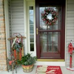 Front Door In Red Front Door Mats Design In Small Size Using Traditional Door Design Made From Wooden Material Decorated With Christmas Wreath Decoration Small Front Door Mats With Minimalist Decorations
