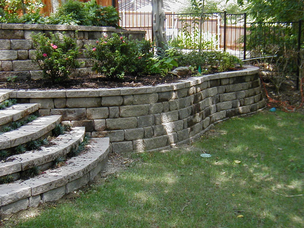 Wall Design Stone Retaining Wall Design Decorated With Stone Material And Green Garden Design Using Small Outdoor Staircase Ideas Garden Retaining Wall Design To Create Beautiful Natural Landscaping Idea In The Yard