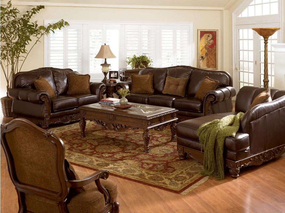 Brown Leather Carving Rustic Brown Leather Sofa Plus Carving Wood Coffee Table Design Also Beautiful Living Room Rug And Torchiere Floor Lamp Furniture  Rediscovering The Elegancy By 10 Brown Leather Sofas 