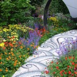 Stainless Steel With Sleek Stainless Steel Archway Combined With Adorable Color Flowery Plants And Comely Garden Path Garden Making A Wonderful Garden Path Ideas Using Stones