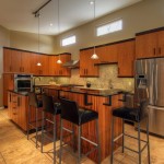 Lighting Above Shaped Small Lighting Above Tiny L Shaped Kitchen Island Closed Metal Bar Stools Foundation On Nice Floor Tile And Wooden Cabinets Closed Pastel Wall Kitchen Guides To Apply L Shaped Kitchen Island For All Size