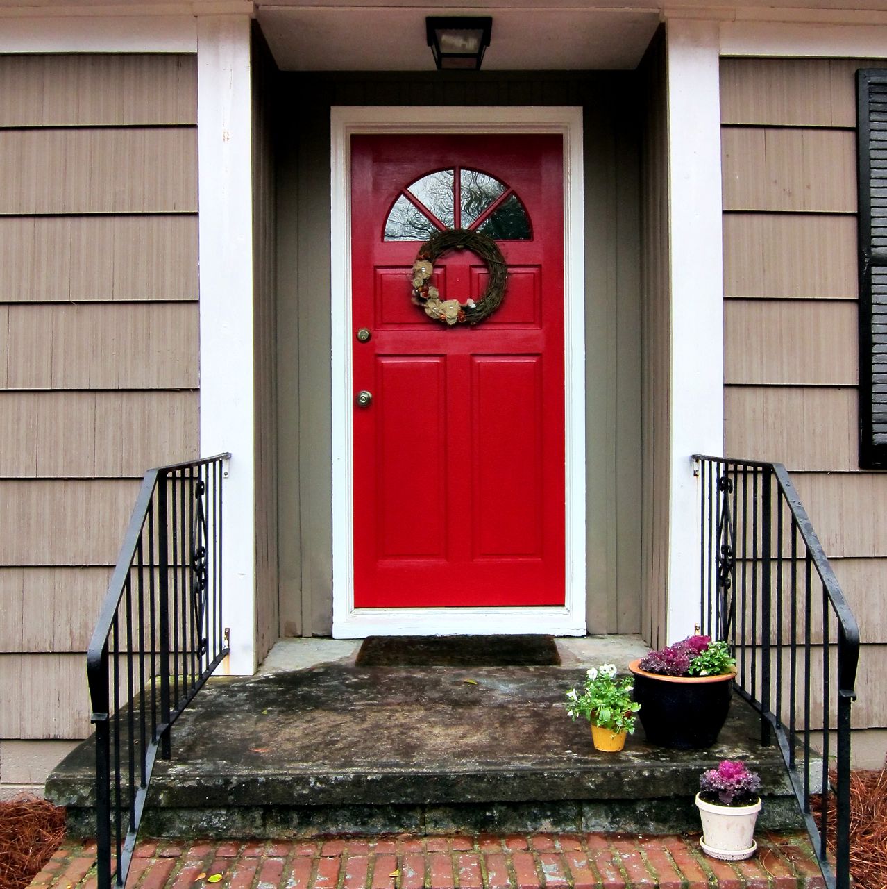Red Front With Small Red Front Door Decorated With Traditional Design Made From Wooden Material Completed With Wreath Door Decoration Ideas Exterior Red Front Door As Surprising Door Design For Modern Home