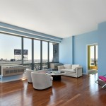 Rocking Chair Awesome Sophisticated Rocking Chair Design In Awesome Long Island City Apartment Feat Soft Blue Wall Paint And Laminated Floor Idea Apartment Compact Long Island City Apartment Interior Design In Open Plan Layout