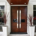 Design Exterior With Stunning Design Exterior Front Door With Couple Long Handles Feat Modern Recessed Lights And Identical Potted Plants Decor Exterior Amazing House Design With Fabulous Front Door Choice