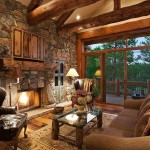 Of A Room View Of A Stunning Living Room With Wooden Floor Leather Couches Coffee Table Stone Walls And Fireplace For Rustic Living Room Ideas Living Room Majestic Rustic Living Room With Delicate Beauty