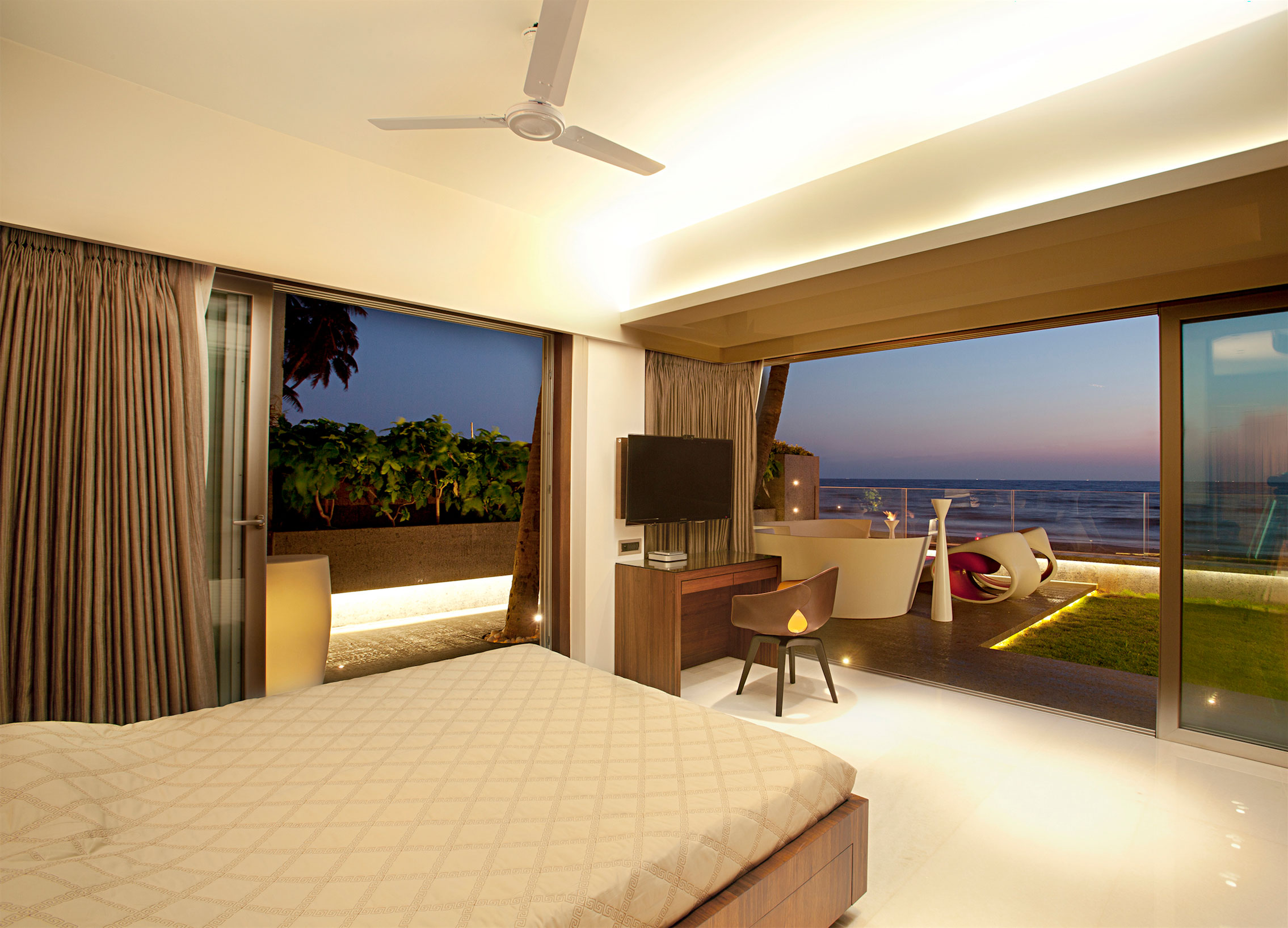Romantic Bedroom Lighting Warm Romantic Bedroom Beach Apartment Lighting Ideas With Glass Sliding Door With Brown Window Curtains Apartment Stylish Beach Apartment With Stunning Terrace And Ocean View