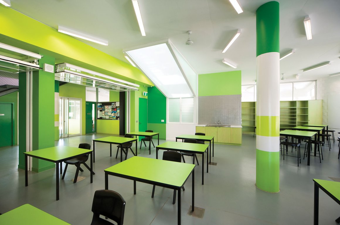 Clasroom Applying Color Wonderful Classroom Applying Green Room Color Of Interior Design School With Desk Completed With Black Chairs Also Furnished With Ceiling Fan And Lighting Interior Design 15 Captivating Interior Design Schools With Vibrant And Colorful Interiors