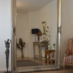 Large Wall Ornately Wonderful Large Wall Mirror With Ornately Frame Design Idea Feat Antique Floor Display And Stripes Accent Chair House Designs  Maximize Your Reflection On A Large Wall Mirror 