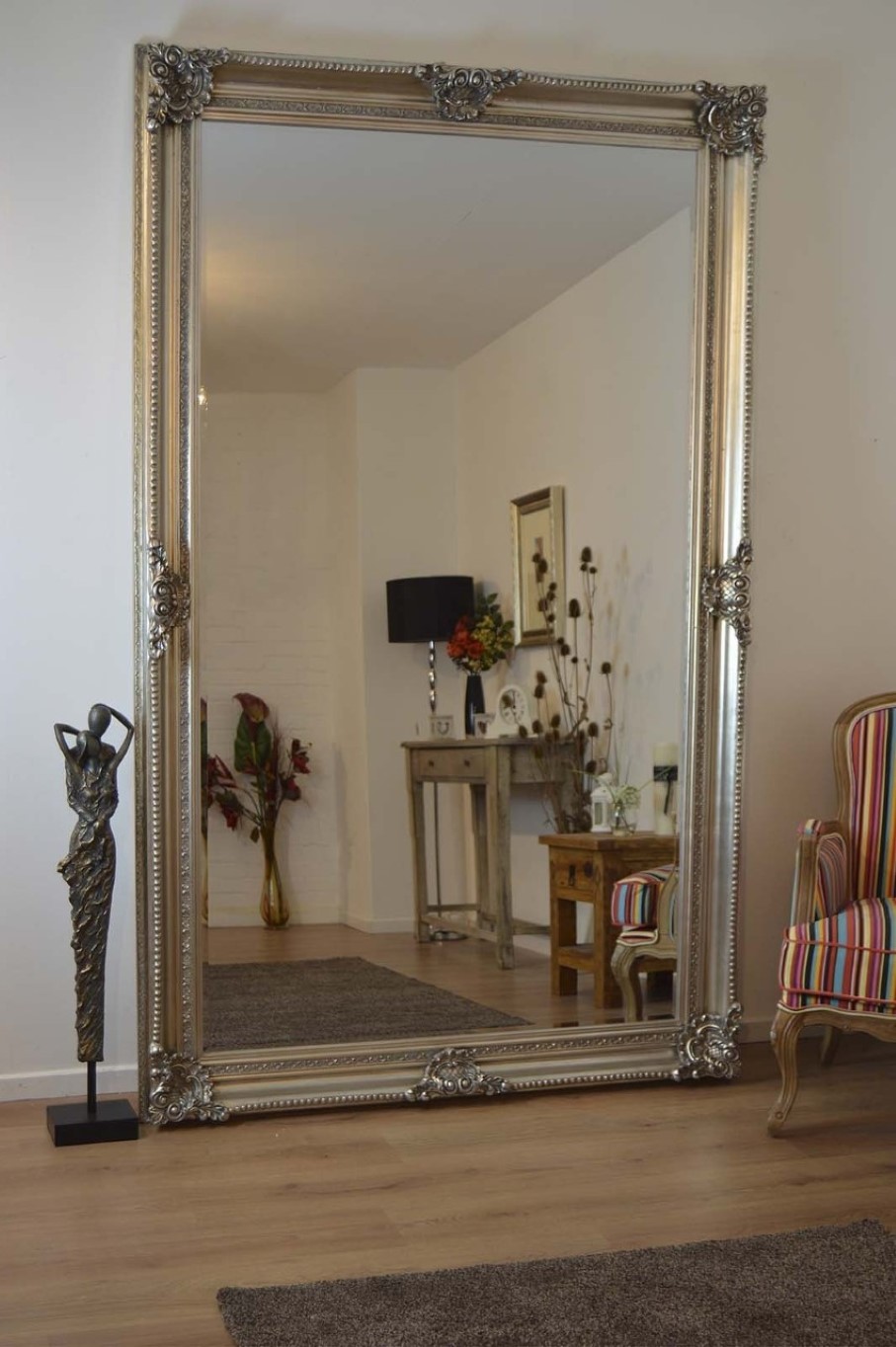 Large Wall Ornately Wonderful Large Wall Mirror With Ornately Frame Design Idea Feat Antique Floor Display And Stripes Accent Chair House Designs  Maximize Your Reflection On A Large Wall Mirror 