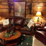 Rustic Living With Wonderful Rustic Living Room Design With Wooden Walls Brown Leather Couches With Pillows And Wooden Round Coffee Table Living Room Majestic Rustic Living Room With Delicate Beauty
