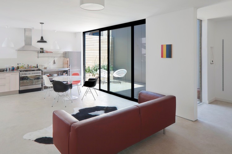 Furniture Inside Edgley Minimalist Furniture Inside Amhurst House Edgley Design With Red Sofa And Cow Capet Also Round White Dining Table Architecture  Prefab House Ideas Compatible For High Mobility Habitant 