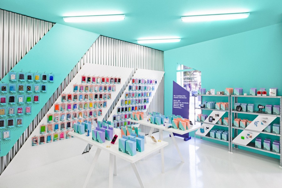Smartphone Store In Alluring Smartphone Store Interior Design In Accent Blue Painting To Combined With Grey Wall Panel And White Furnishing Decoration  Gadget Outlet With Industrious Look 
