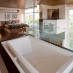 Bathroom Bedroom Room Awesome Bathroom Bedroom In Same Room With Wooden Flooring Ideas Completed Wood Platform Bed And Porcelain Bathtub Bathroom Small Bathroom Interior Ideas To Conceal The Lack Of Space