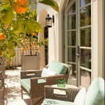 Balcony With And Lovely Balcony With Rattan Armchairs And Round Coffee Table At Bonesteel Trout Hall Interior Design With Orange Tree Decoration Colorful Home Decor With Various Colors And Patterns