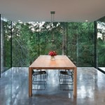Design Of In Naturally Design Of Dining Area In Russet Splyce Design With Glass Wall Appearing Green Vegetations Outside The House Exterior Magnificent Open Wall Home Design Implementing Elegant Style