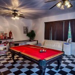 Family Room Camp Playful Family Room Of Orange Camp Road Featured With Black And Red Billiard Court To Work With Checkerboard Style Flooring Architecture Simple Natural Home With Futuristic Architecture Decoration