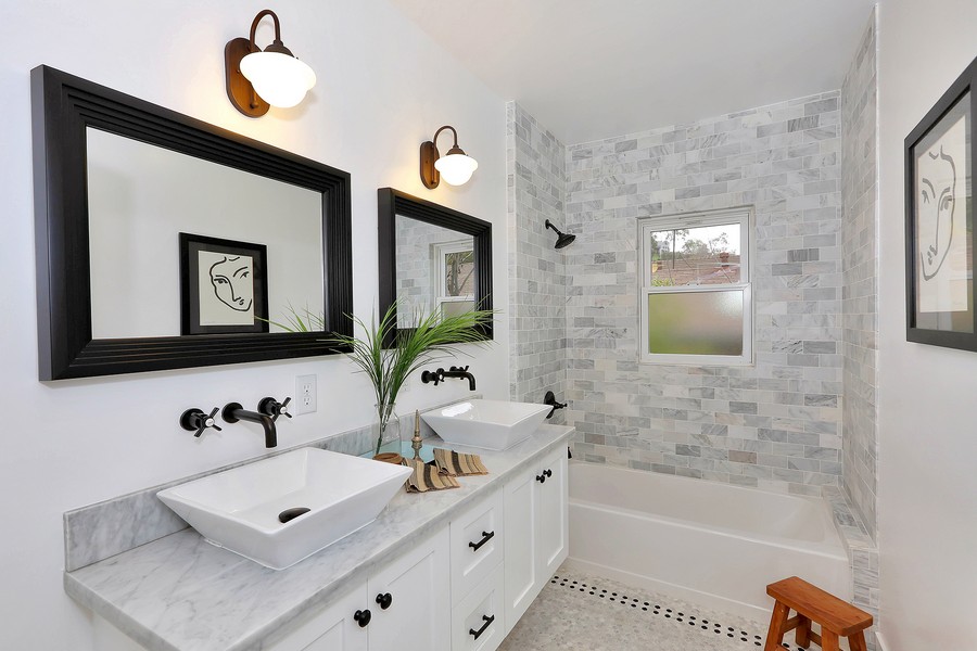 White Bathroom Wall Stylish White Bathroom With Tiled Wall Surrounding Tub And Marble Countertop For White Floating Vanity Combined With White And Black Accents Architecture House Remodel Transformed From Classic Bungalow