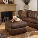 Leopard Skin Brown Beautiful Leopard Skin Rug Also Brown Leather Sofa And Square Ottoman Table Plus Wood Fireplace Insert In Rustic Living Room Living Room Rustic Living Room Appears Fantastic Performance